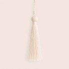 10 Borlas color crema